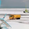 Tuyết phủ trắng sân bay Jeju, Hàn Quốc. (Nguồn: AFP/TTXVN)