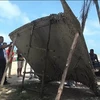 Mảnh vỡ bằng kim loại được các ngư dân Thái Lan tìm thấy tại Nakhon Si Thammarat. (Nguồn: Daily Mail/TTXVN)
