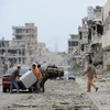 Khung cảnh tan hoang của thành thành phố Sirte. (Nguồn: AFP/TTXVN)