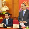 Phó Thủ tướng Nguyễn Xuân Phúc phát biểu tại buổi làm việc. (Ảnh: An Đăng/TTXVN)