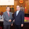 Phó Thủ tướng Nguyễn Xuân Phúc tiếp Bộ trưởng Bộ Khoa học và Công nghệ Lào Boviengkham Vongdara. (Ảnh: Phương Hoa/TTXVN)