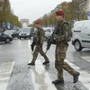 Cảnh sát Pháp tuần tra trên đại lộ Champs-Elysees ở Paris. (Nguồn: AFP/ TTXVN)