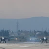 Máy bay chiến đấu Sukhoi Su-24 của Nga tại căn cứ quân sự Hmeimin thuộc tỉnh Latakia, miền Tây Bắc Syria. (Nguồn: AFP/TTXVN)