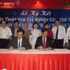 Lễ ký kết thỏa thuận giữa ICDREC và Công ty Điện Quang. (Nguồn: Vietnam+)