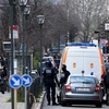 Cảnh sát Bỉ làm nhiệm vụ trong cuộc bố ráp tại khu vực quận Schaerbeek ở thủ đô Brussels. (Nguồn: AFP/TTXVN)