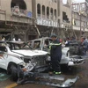 Hiện trường một vụ đánh bom ở Baghdad. (Nguồn: AFP)