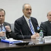 Trưởng đoàn đàm phán của phái đoàn Chính phủ Syria Bashar al-Jaafari (giữa) trong một cuộc họp ở Geneva, Thụy Sĩ ngày 24/3. (Nguồn: AFP/TTXVN)