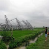 Cột điện bị đổ gây ra sự cố đường dây 500kV Hiệp Hòa-Quảng Ninh. (Ảnh: Việt Hùng/TTXVN)