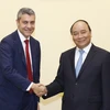 Thủ tướng Nguyễn Xuân Phúc tiếp ông Andrea Vella, Giám đốc điều hành, Trưởng Ngân hàng Đầu tư Goldman Sachs châu Á. (Ảnh: Thống Nhất/TTXVN)