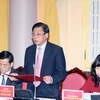 Phó Chủ nhiệm Văn phòng Chủ tịch nước Giang Sơn công bố Pháp lệnh của Chủ tịch nước. (Ảnh: Nguyễn Dân/TTXVN)