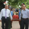 Lễ đón, truy điệu và an táng 35 hài cốt liệt sỹ. (Nguồn: quangbinh.gov.vn)