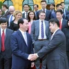 Chủ tịch nước Trần Đại Quang với các đại biểu doanh nghiệp Brunei. (Ảnh: Nhan Sáng/TTXVN)