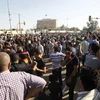 Hàng nghìn người biểu tình tụ tập tại trung tâm thủ đô Baghdad. (Nguồn: EPA/TTXVN)