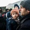 Người di cư Syria chờ để sang Hy Lạp sau khi bị cảnh sát Thổ Nhĩ Kỳ bắt giữ tại Canakkale, Thổ Nhĩ Kỳ. (Nguồn: AFP/TTXVN)