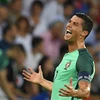 Cristiano Ronaldo mừng chiến thắng sau trận đấu với xứ Wales. (Nguồn: AFP/TTXVN)