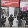 Lực lượng đặc nhiệm Brazil tham gia cuộc diễn tập chống khủng bố tại Rio de Janeiro. (Nguồn: AFP/TTXVN)