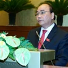 Thủ tướng Nguyễn Xuân Phúc phát biểu tại Quốc hội. (Ảnh: Thống Nhất/TTXVN)