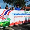 Người dân Thái Lan tham gia cuộc tuần hành kêu gọi tham gia cuộc trưng cầu dân ý về dự thảo Hiến pháp mới. (Nguồn: AFP/TTXVN)