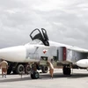 Máy bay ném bom Su-24 của Nga tại căn cứ không quân Hmeimym, tỉnh Latakia, Syria. (Nguồn: EPA/TTXVN)