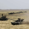 Xe tăng Ukraine di chuyển hướng tới biên giới với Crimea. (Nguồn: nymag.com)