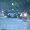 Mưa lớn do bão số 3 gây ngập nhiều tuyến phố ở Hà Nội. (Ảnh: Minh Sơn/Vietnam+)