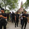 Cảnh sát gác tại nhà thờ sau vụ tấn công. (Nguồn: AFP/TTXVN)