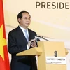 Chủ tịch nước Trần Đại Quang đến dự và phát biểu tại Diễn đàn Doanh nghiệp Việt Nam-Singapore. (Ảnh: Nhan Sáng/TTXVN)