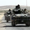  Xe tăng của Thổ Nhĩ Kỳ tham gia chiến dịch quân sự chống các tay súng người Kurd tại khu vực biên giới với Syria. (Nguồn: EPA/TTXVN)