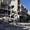 Cảnh đổ nát sau vụ đánh bom tại khu vực Bab Tadmur thuộc tỉnh Homs, Syria. (Nguồn: EPA/TTXVN)