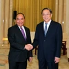 Thủ tướng Nguyễn Xuân Phúc hội kiến với Chủ tịch Chính hiệp toàn quốc Trung Quốc Du Chính Thanh. (Ảnh: Thống Nhất/TTXVN)