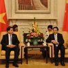 Chủ tịch Ủy ban Nhân dân thành phố Hà Nội Nguyễn Đức Chung và Thị trưởng Bắc Kinh Vương An Thuận. (Nguồn: TTXVN)