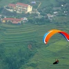 Các phi công bay lượn quanh khu vực đèo Khau Phạ, huyện Mù Cang Chải, Yên Bái. (Ảnh: Thế Duyệt/TTXVN)