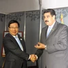 Phó Thủ tướng Phạm Bình Minh gặp Tổng thống Venezuela Nicolas Maduro. (Ảnh: Vũ Lê Hà/TTXVN)
