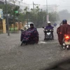 Nhiều tuyến đường ở thành phố Huế bị ngập lụt nặng. (Ảnh: Quốc Việt/TTXVN)
