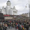 Quang cảnh cuộc biểu tình tại Helsinki, Phần Lan. (Nguồn: EPA/TTXVN)