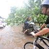 Cảnh ngập lụt sau khi bão Megi tràn qua tỉnh Phúc Kiến, Trung Quốc. (Nguồn: THX/TTXVN)