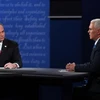 Hai ứng viên Phó Tổng thống Mỹ Tim Kaine (trái) và Mike Pence tại cuộc tranh luận. (Nguồn: usatoday.com)