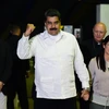 Tổng thống Venezuela Nicolas Maduro (giữa) tại Caracas ngày 30/10. (Nguồn: AFP/TTXVN)
