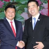 Phó Chủ tịch UBND Thành phố Hồ Chí Minh Huỳnh Cách Mạng tiếp Thống đốc tỉnh Shiga Taizo Mikazuki. (Ảnh: Thanh Vũ/TTXVN)