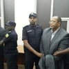 Hai đối tượng Jean-Claude Iyamuremye và Jean-Baptiste Mugimba bị dẫn độ về Rwanda. (Nguồn: therwandan.com)