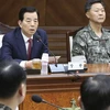 Bộ trưởng Quốc phòng Hàn Quốc Han Min-koo (trái, phía xa) chủ trì phiên họp với các tư lệnh quân đội ở Seoul. (Nguồn: EPA/TTXVN)