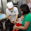 Tiêm vắcxin cho trẻ tại Trung tâm Y tế dự phòng Thành phố Hồ Chí Minh. (Ảnh: Phương Vy/TTXVN)