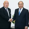 Thủ tướng Nguyễn Xuân Phúc tiếp Cố vấn đặc biệt nội các Chính phủ Nhật Bản Isao Iijima. (Ảnh: Thống Nhất/TTXVN)