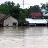 Một khu dân cư ở thôn Phước Khánh, xã Hòa Trị, huyện Phú Hòa vẫn còn ngập. (Ảnh: Thế Lập/TTXVN)