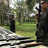 Vũ khí của các tay súng FARC được giao nộp cho Chính phủ Colombia. (Nguồn: AFP/TTXVN)