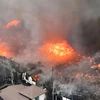 Hỏa hoạn đã thiêu rụi 140 tòa nhà. (Nguồn: AP)