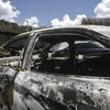 Thi thể bị đốt cháy của ông Amiridis được phát hiện trong chiếc xe ôtô cháy đen. (Nguồn: EPA)