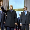 Đại diện cho cộng đồng người Cyprus gốc Hy Lạp, ông Mustafa Akinci (trái) và Đặc phái viên LHQ về tái thống nhất đảo Cyprus, ông Espen Barth Eide (phải) trước vòng đàm phán tại Geneva. (Nguồn: AFP/TTXVN)