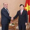 Phó Thủ tướng Trịnh Đình Dũng tiếp Phó Thủ tướng Uzbekistan Mirzaev Zoyir. (Ảnh: Phương Hoa/TTXVN)