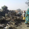 Hiện trường một vụ nổ ở Nigeria. (Nguồn: EPA/TTXVN)